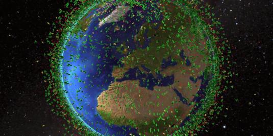 Illustration de la terre entourée de débris spatiaux